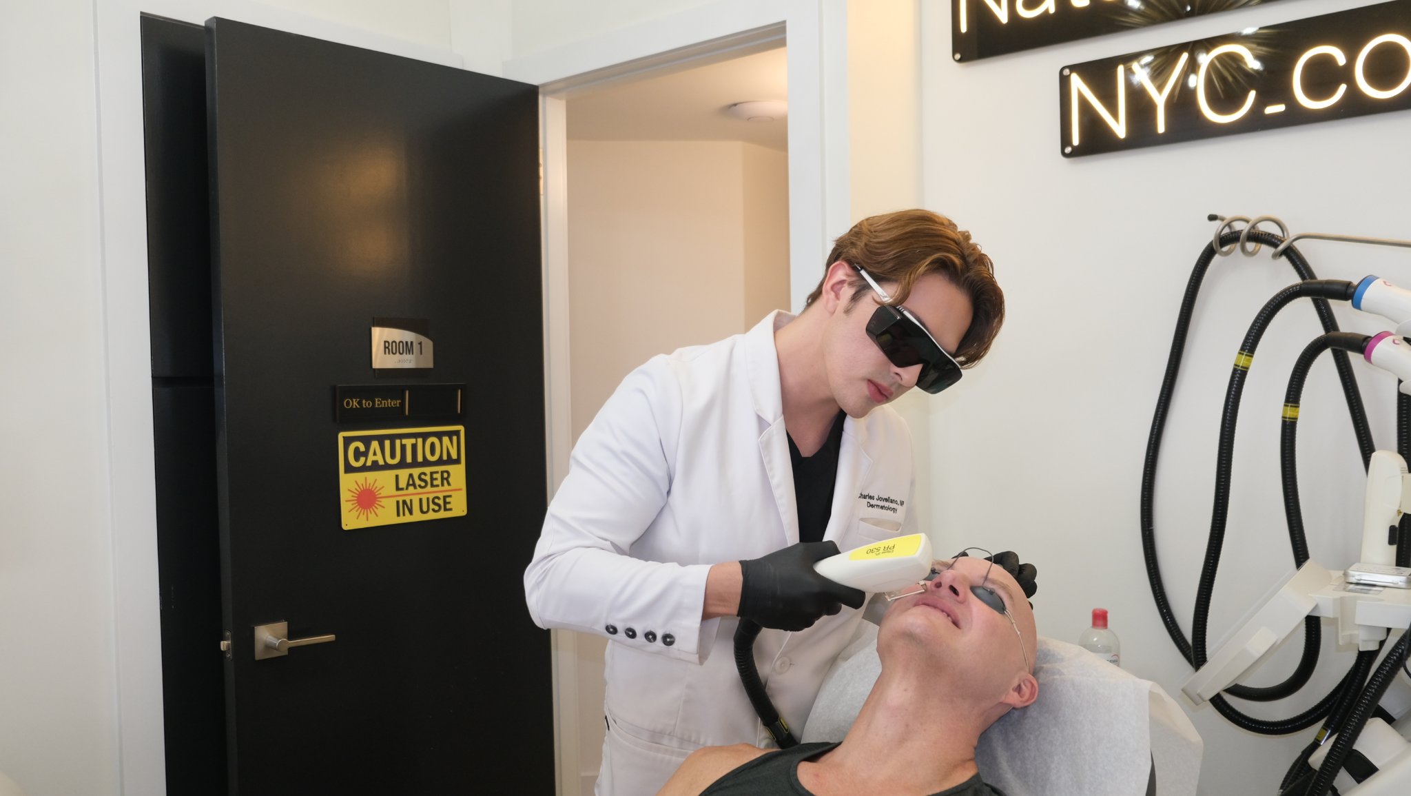 Provider performing laser resurfacing treatment on a patient's face at Natural Beauty Fifth Avenue's Main Office in New York